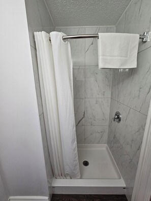 Standard Room, 2 Queen Beds | Bathroom | Combined shower/bathtub, free toiletries, hair dryer, towels