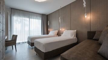 Deluxe Suite, Garden View | Extra beds