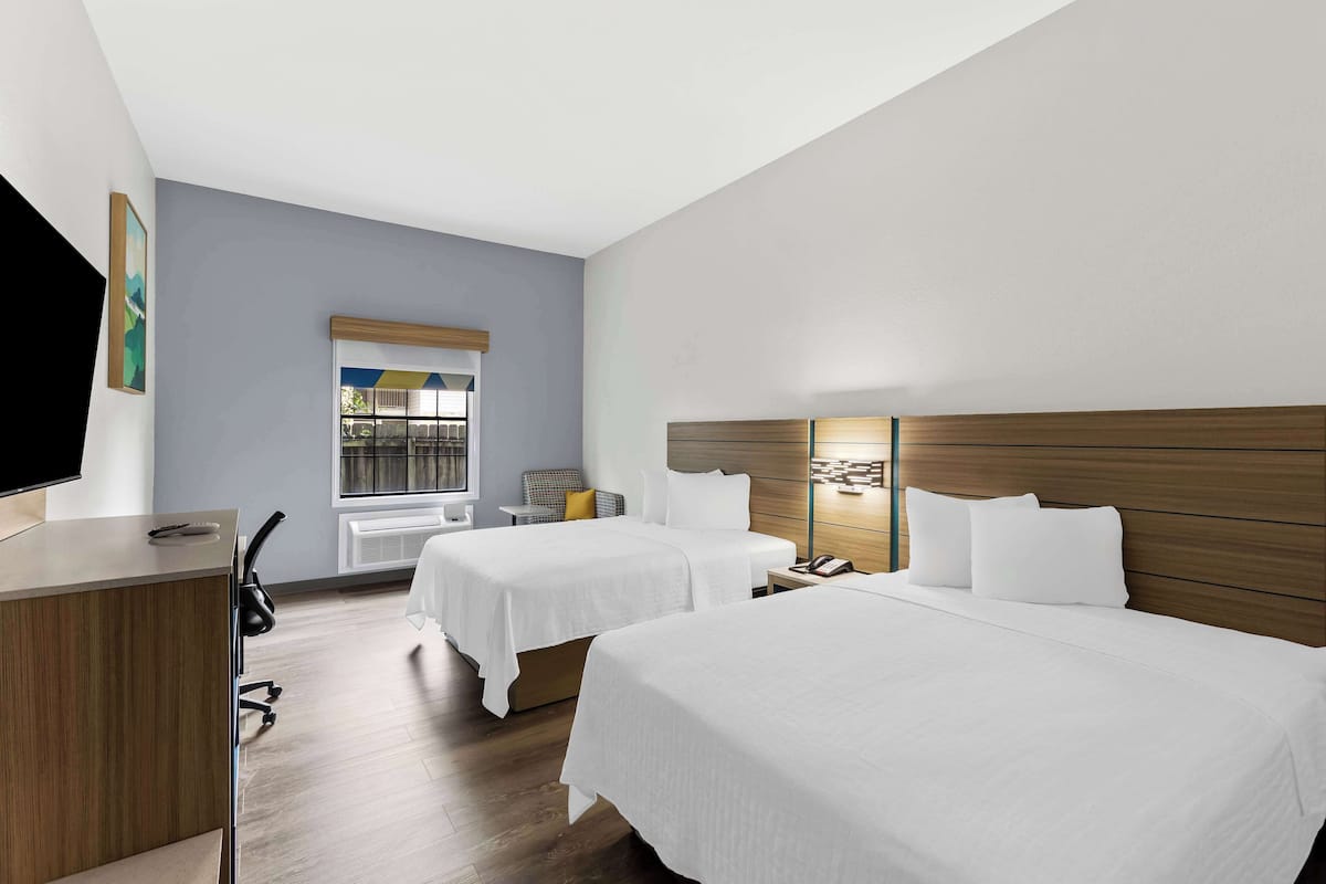 Room, 2 Queen Beds | Egyptian cotton sheets, pillowtop beds, minibar, individually decorated