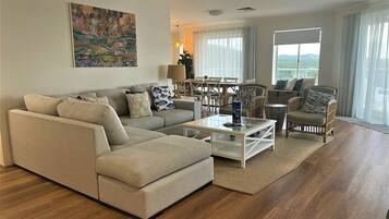 Three Bedroom Presidential | Living area | 30-inch flat-screen TV with cable channels, TV