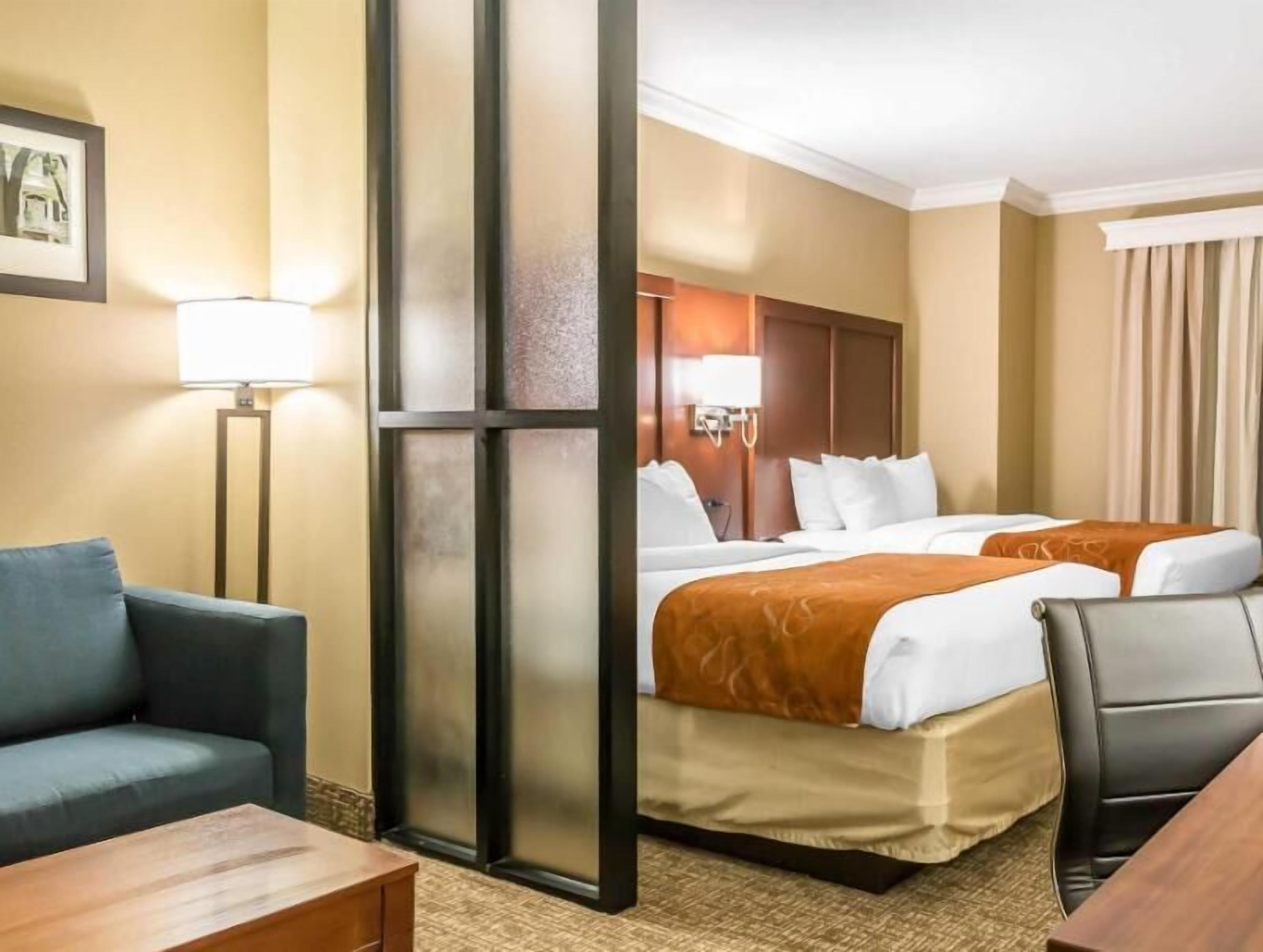 Pillowtop beds, desk, laptop workspace, blackout drapes