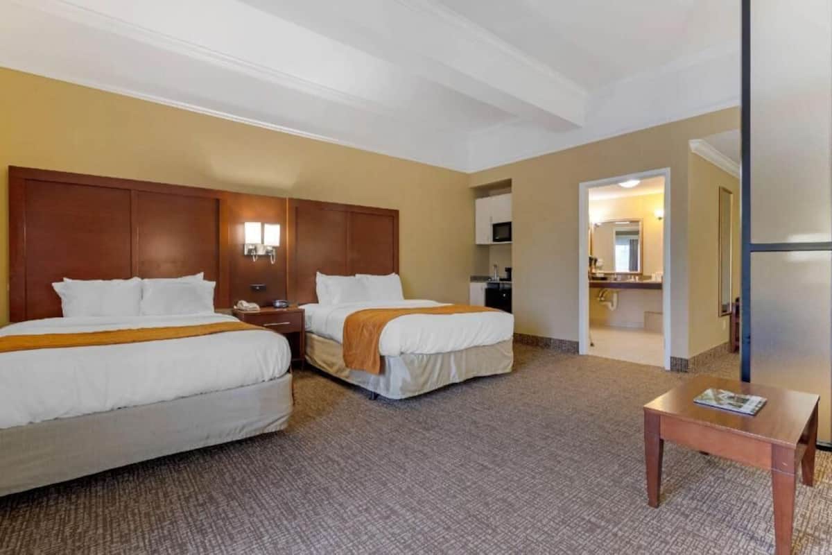 Pillowtop beds, desk, laptop workspace, blackout drapes