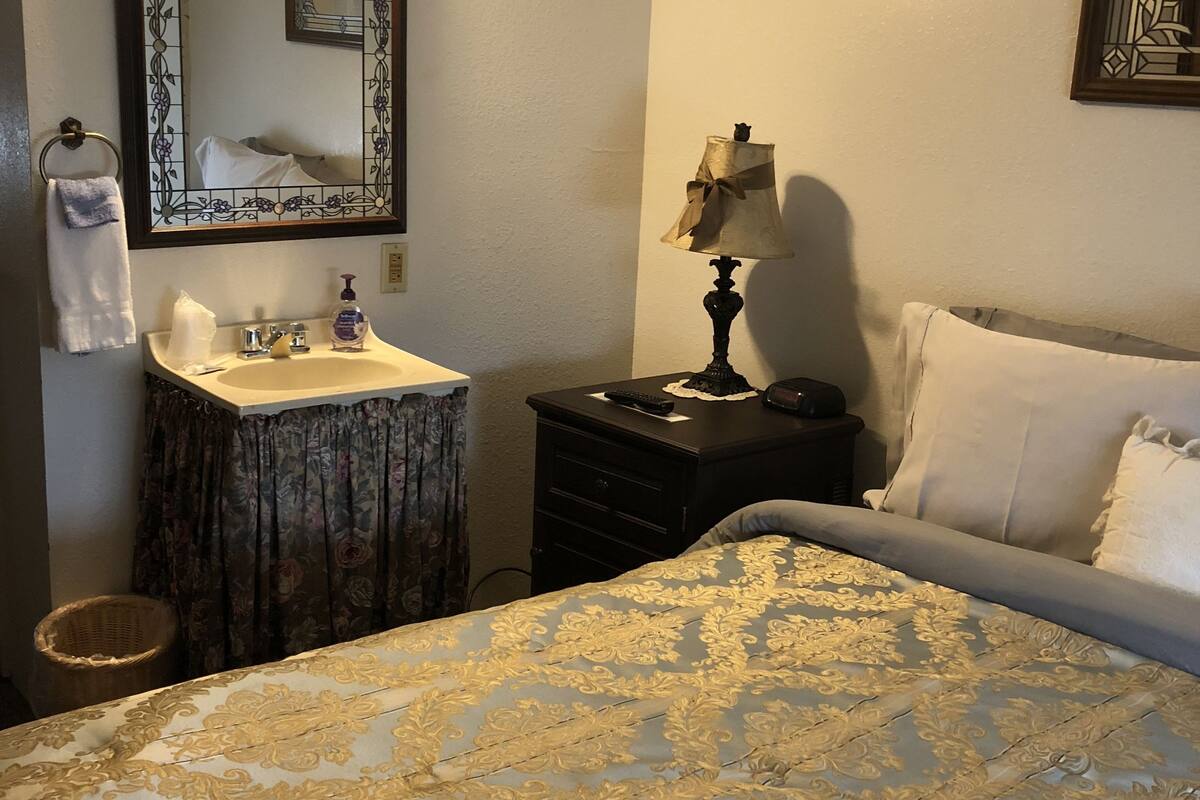 room (room #8, queen bed) | individually decorated, individually furnished, iron/ironing board