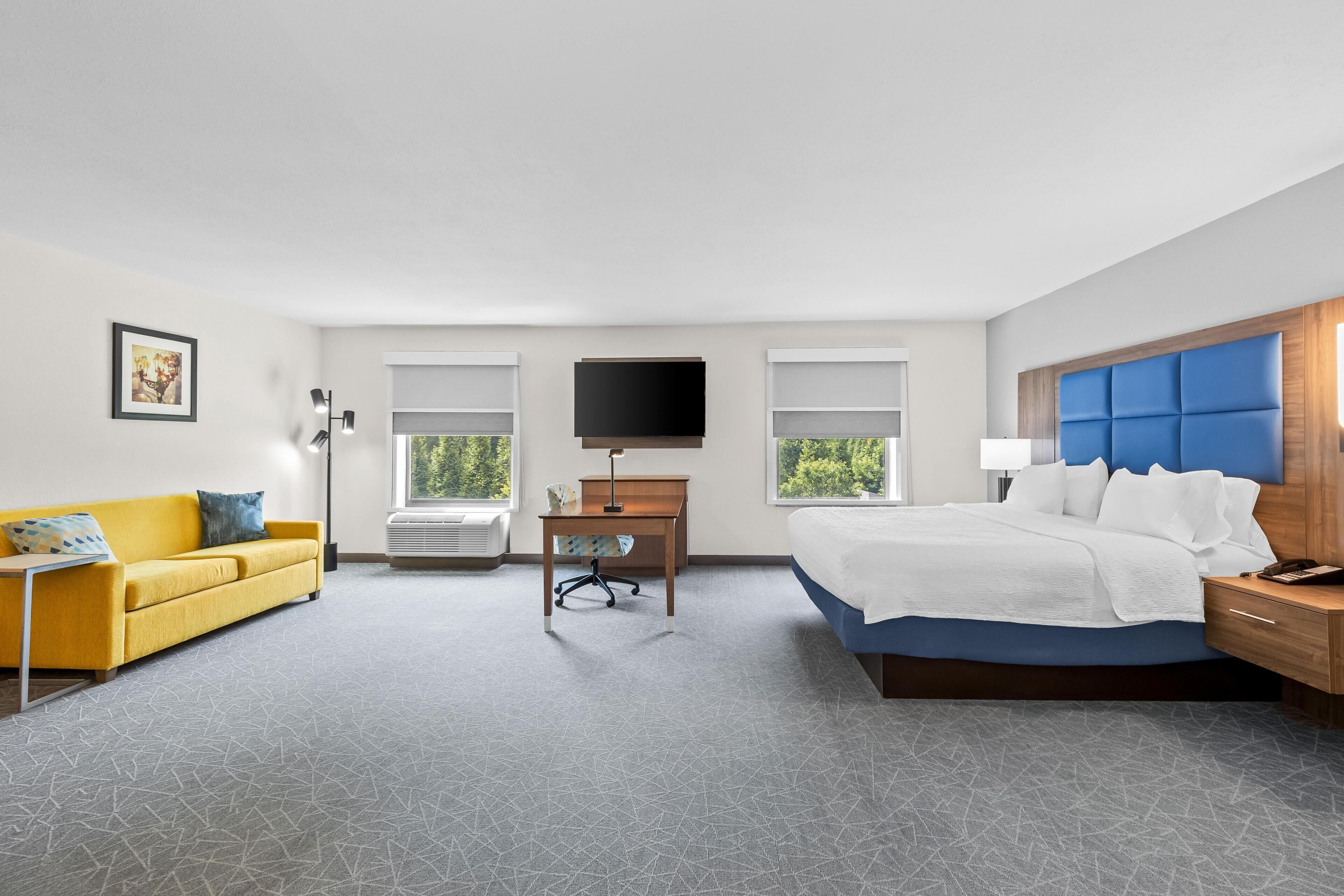 Studiosuite, 1 kingsize-seng | Barnesenger (inkludert), wi-fi (inkludert), vekkerklokke og sengetøy