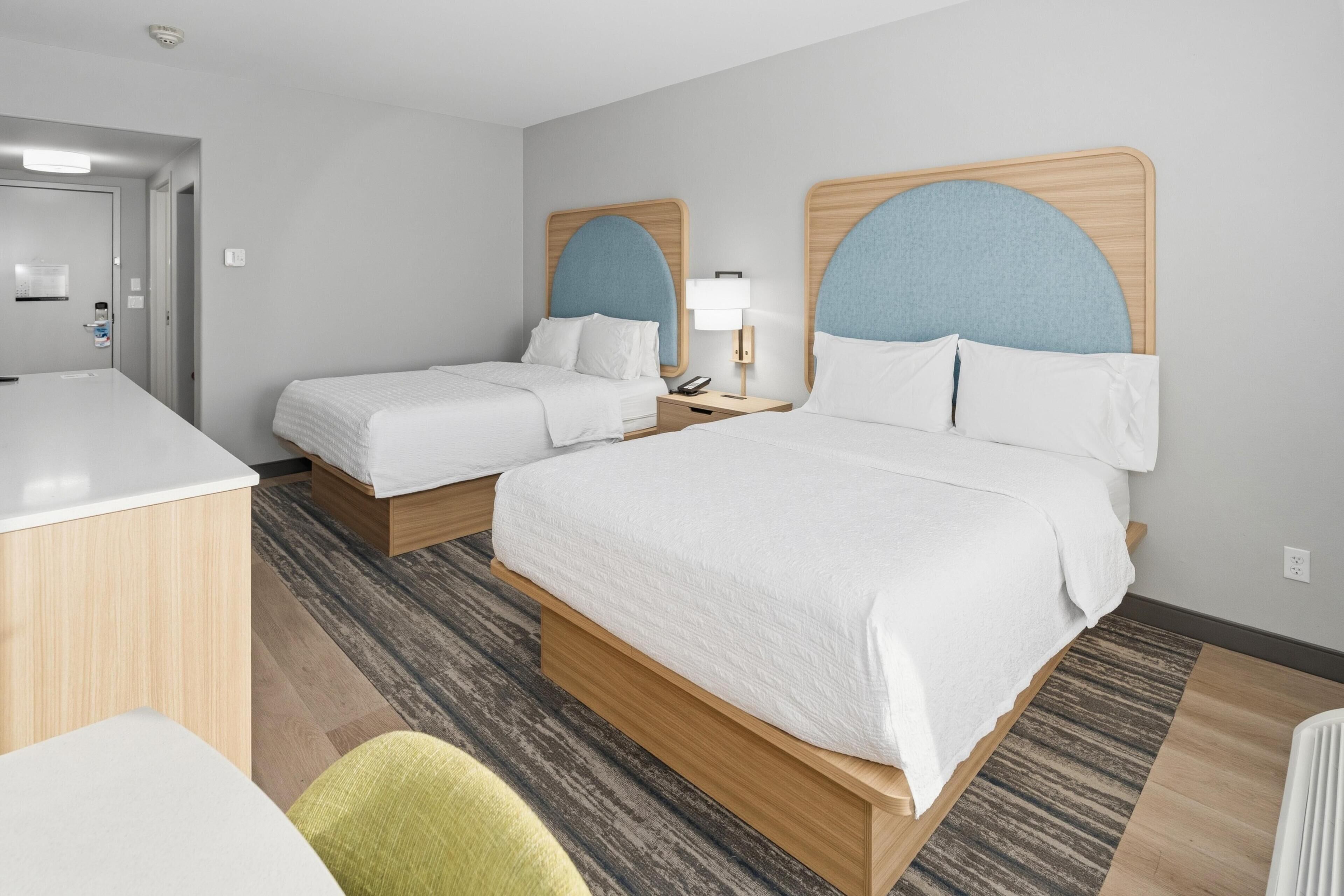 Two queens beds ns | Premium bedding, in-room safe, desk, iron/ironing board