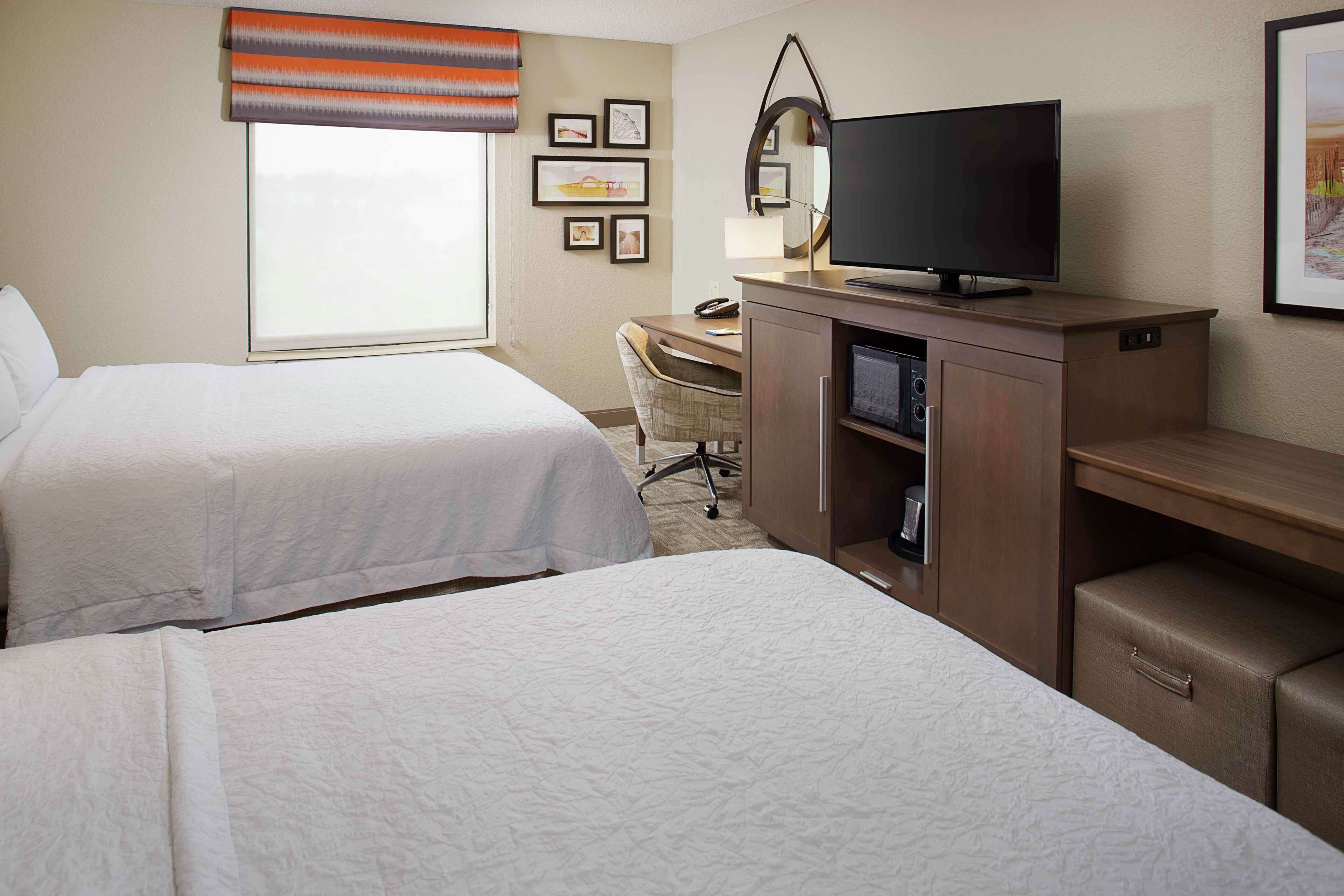 Desk, laptop workspace, iron/ironing board, free cots/infant beds