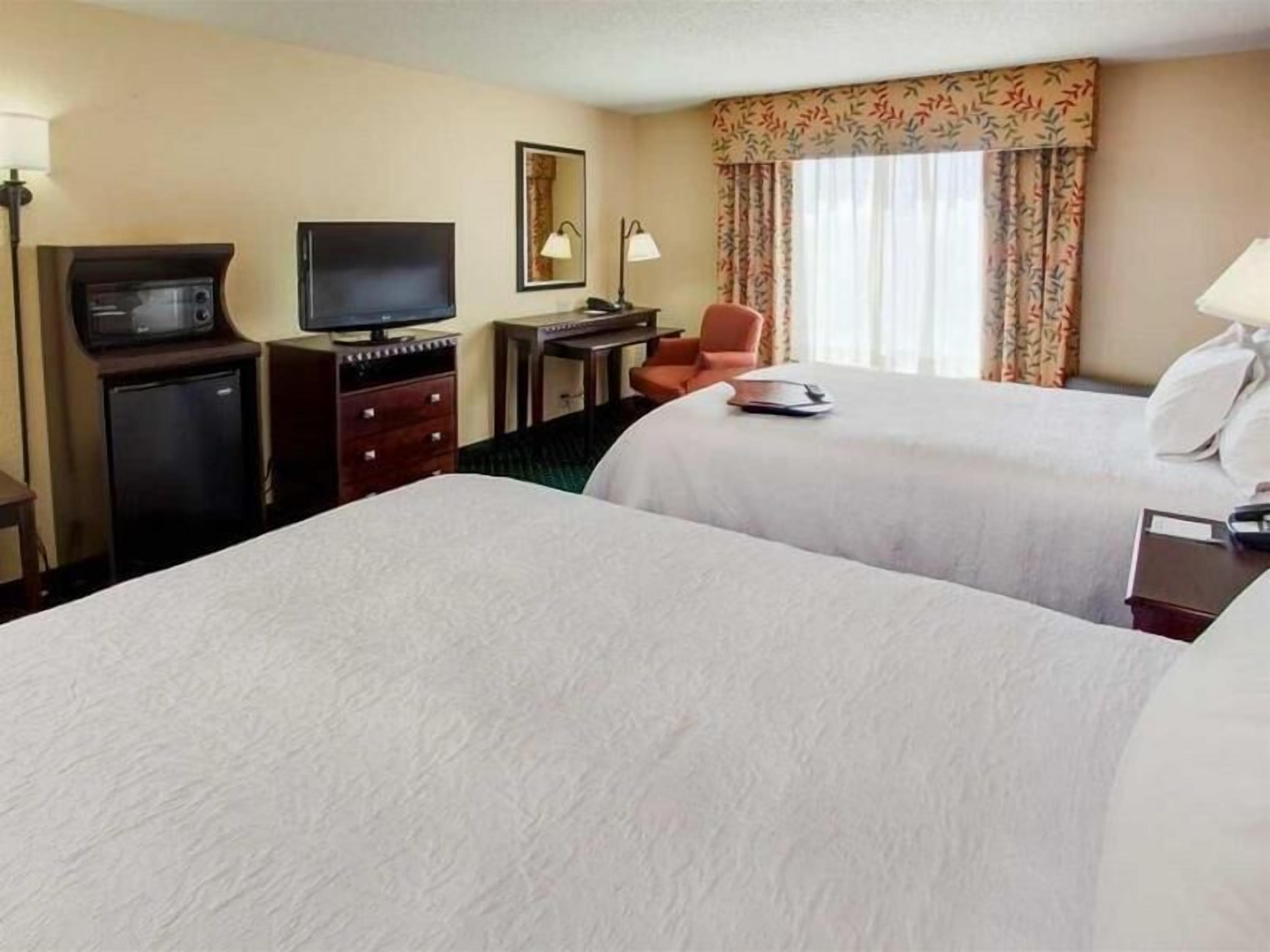 Desk, laptop workspace, iron/ironing board, free cots/infant beds