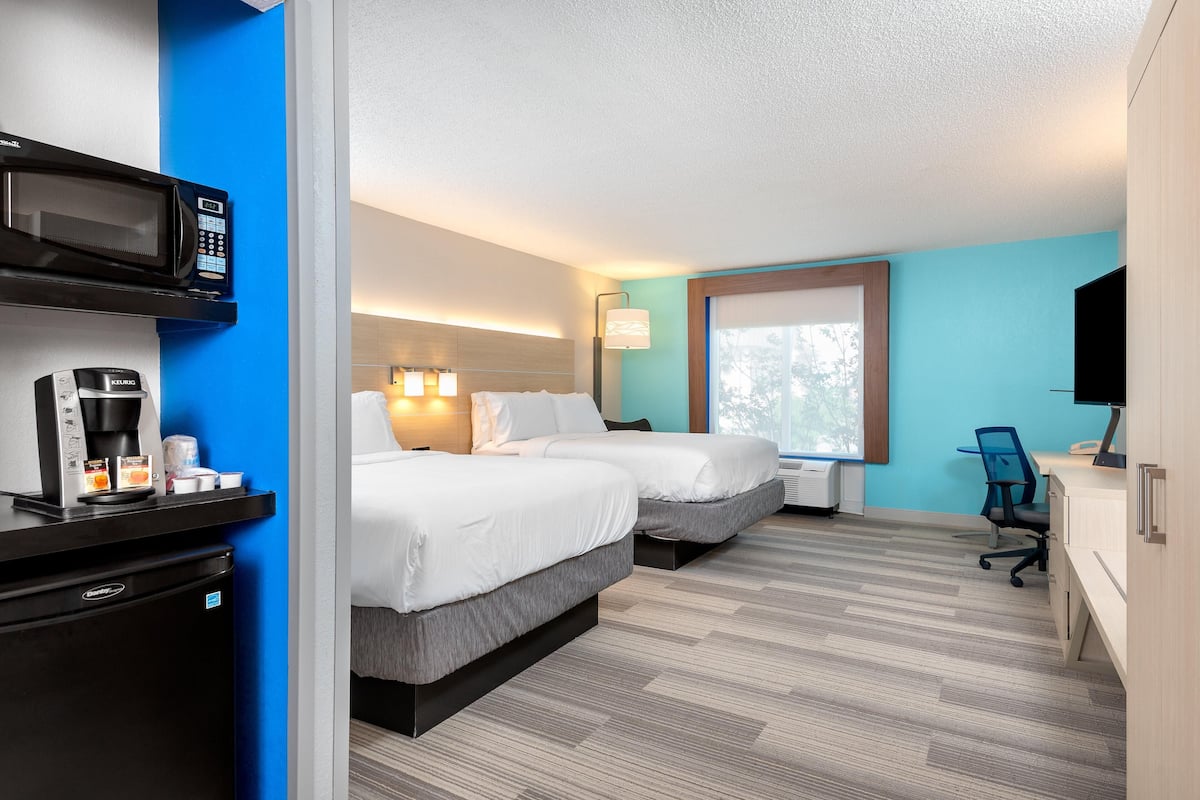 In-room safe, desk, iron/ironing board, cribs (free)