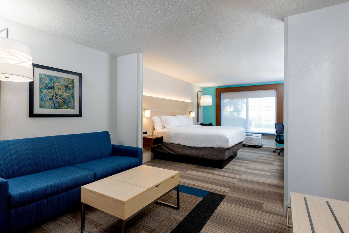 Suite, 1 King Bed (Additional Living Dining Area) | In-room safe, desk, iron/ironing board, cribs (free)