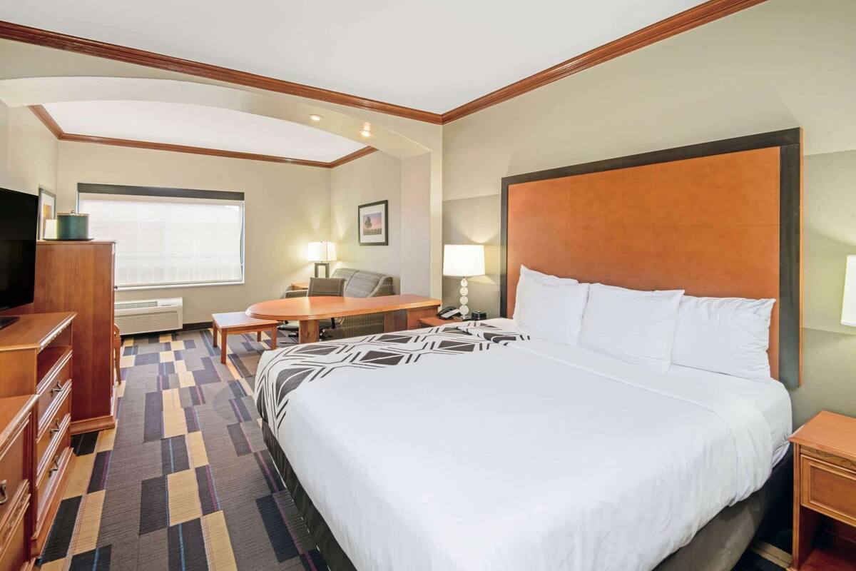 Premium bedding, desk, blackout drapes, iron/ironing board