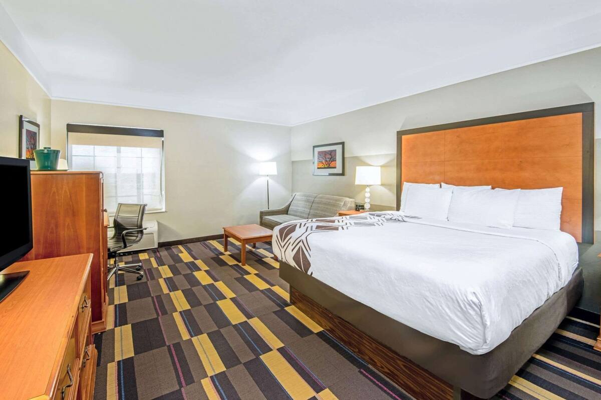 Premium bedding, desk, blackout drapes, iron/ironing board