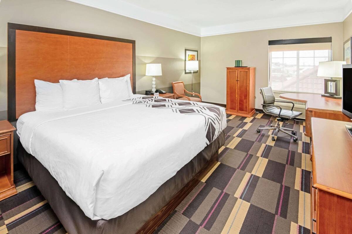Premium bedding, desk, blackout drapes, iron/ironing board