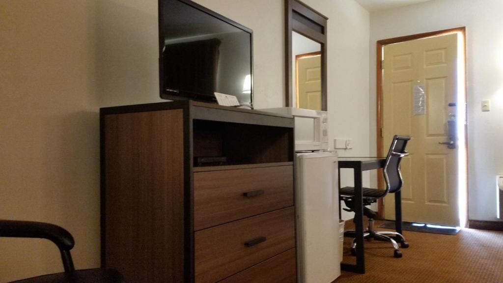 Desk, laptop workspace, blackout curtains, free WiFi
