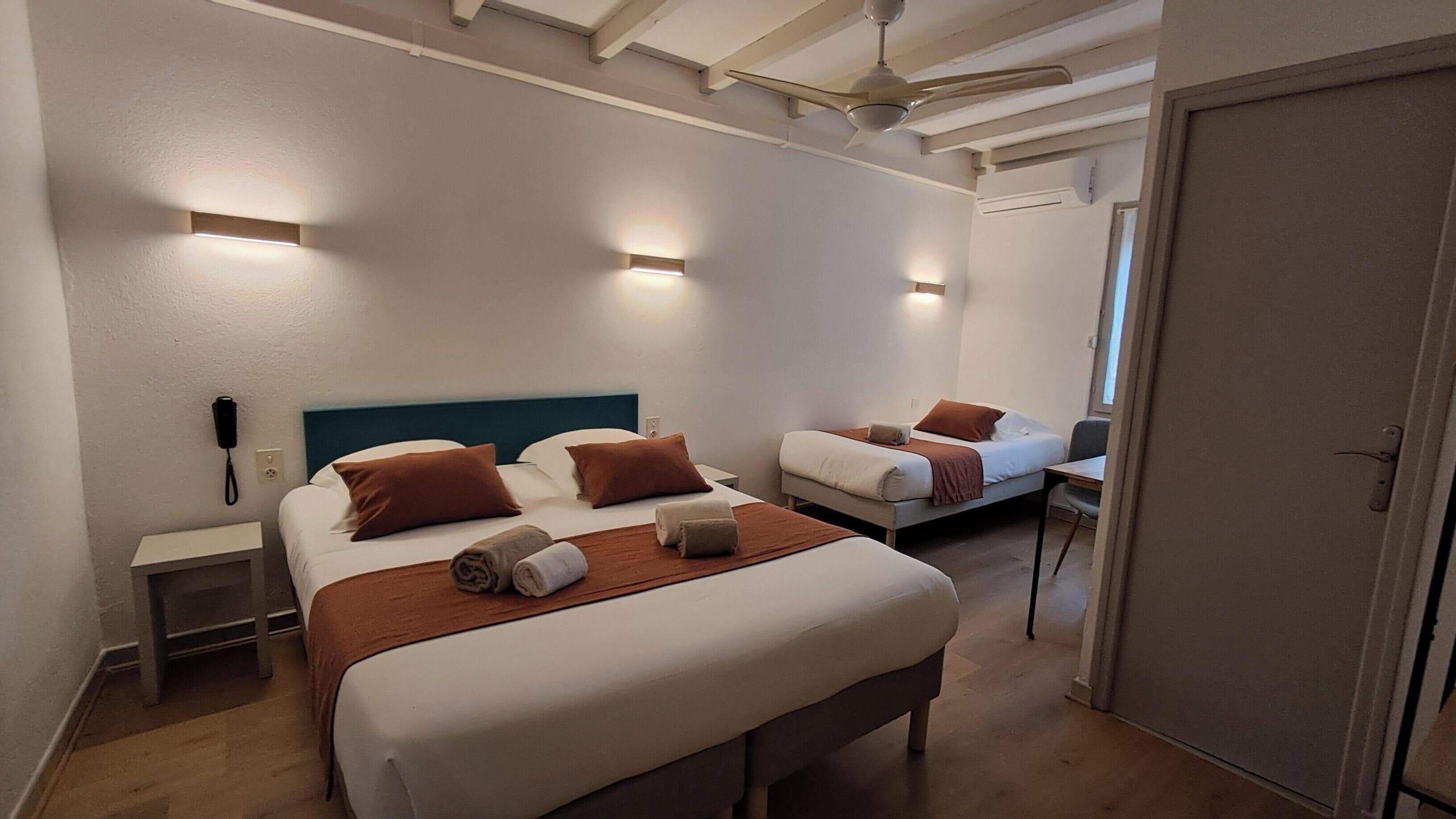 Triple Room | Select Comfort beds, desk, soundproofing, free WiFi