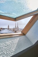 Triple Room (Attic room) | Premium bedding, desk, blackout drapes, iron/ironing board