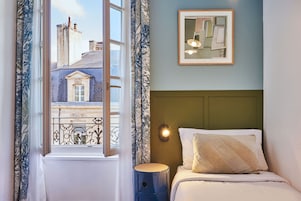 Twin Room | Premium bedding, desk, blackout drapes, iron/ironing board