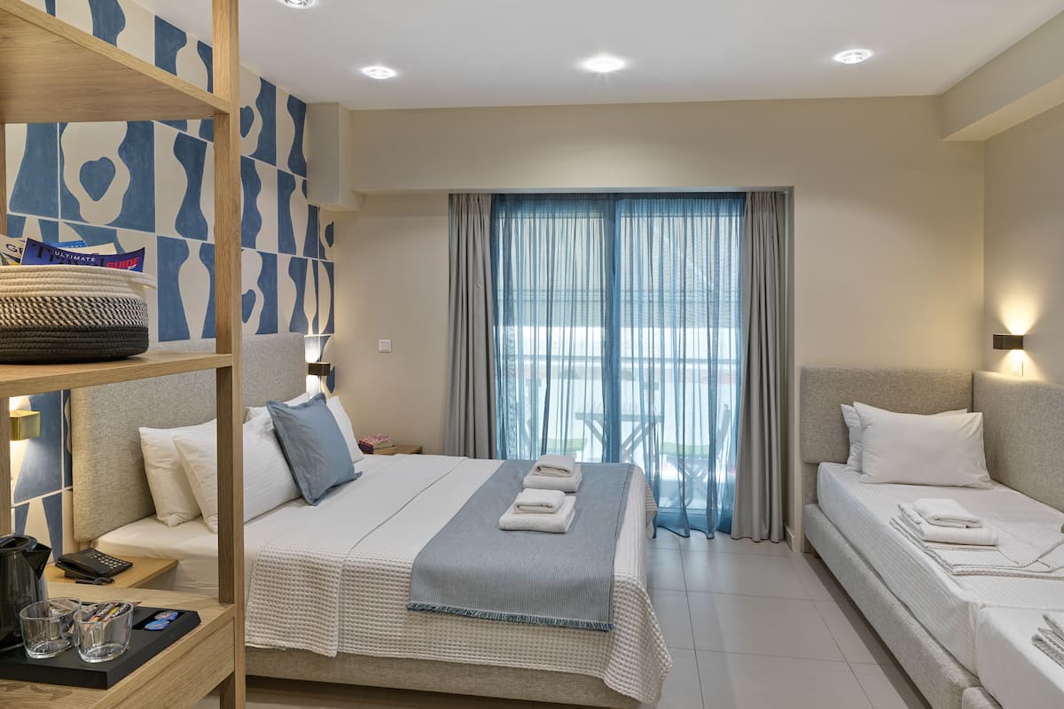 quadruple room | premium bedding, down duvets, minibar, in-room safe