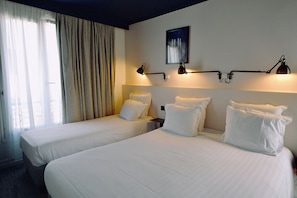 Triple Room | Premium bedding, Select Comfort beds, in-room safe, desk - Hotel Lucien (Paris)