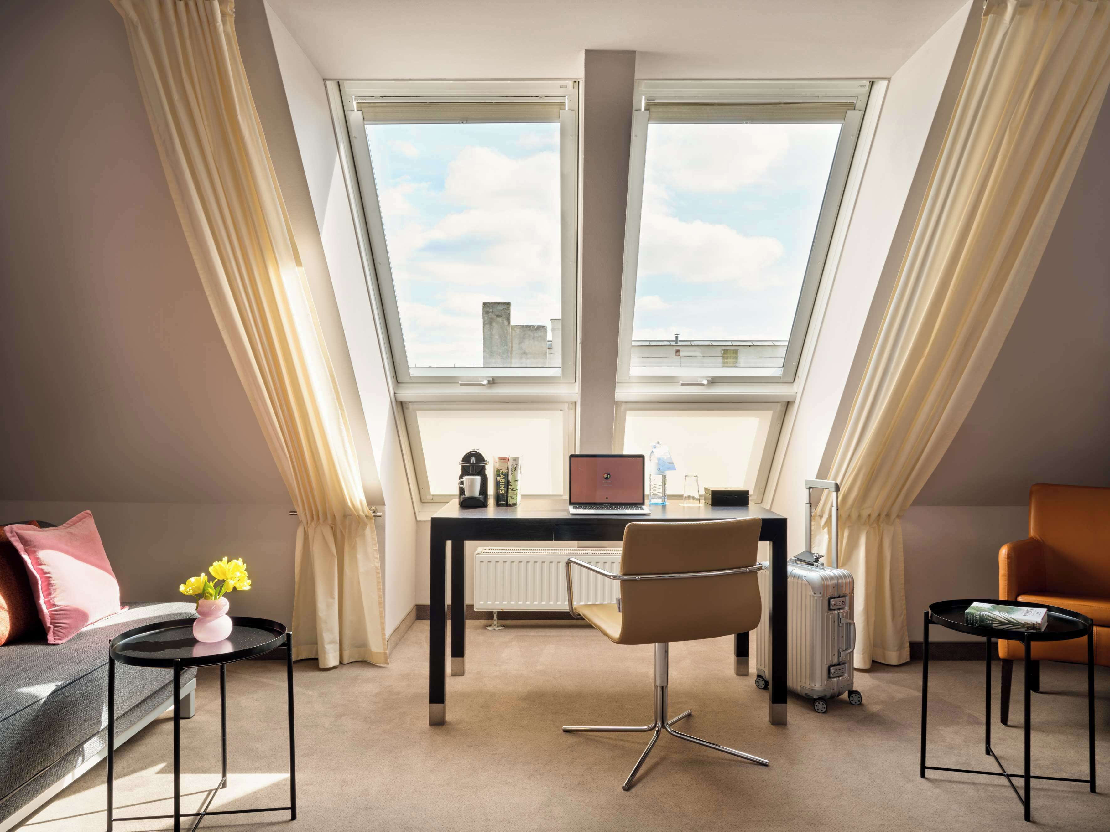 signature suite | living room | 32-inch tv with satellite channels, streaming services