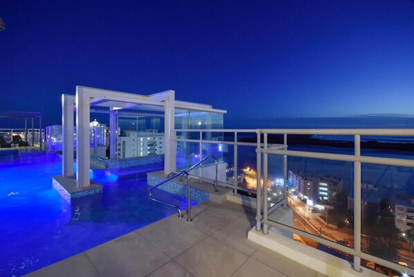 Outdoor pool, pool umbrellas, pool loungers