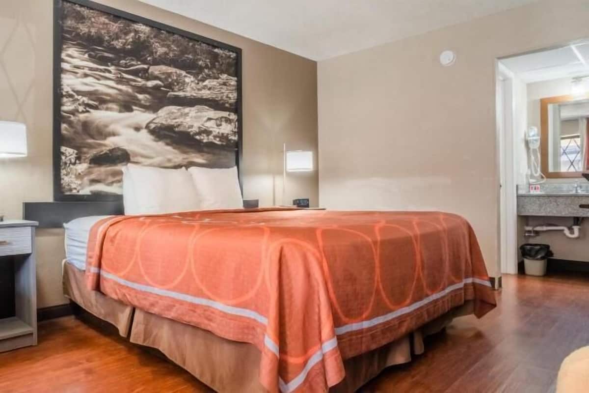 Desk, laptop workspace, blackout curtains, iron/ironing board