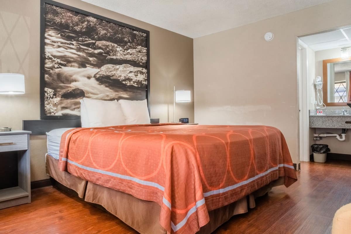 Desk, laptop workspace, blackout curtains, iron/ironing board
