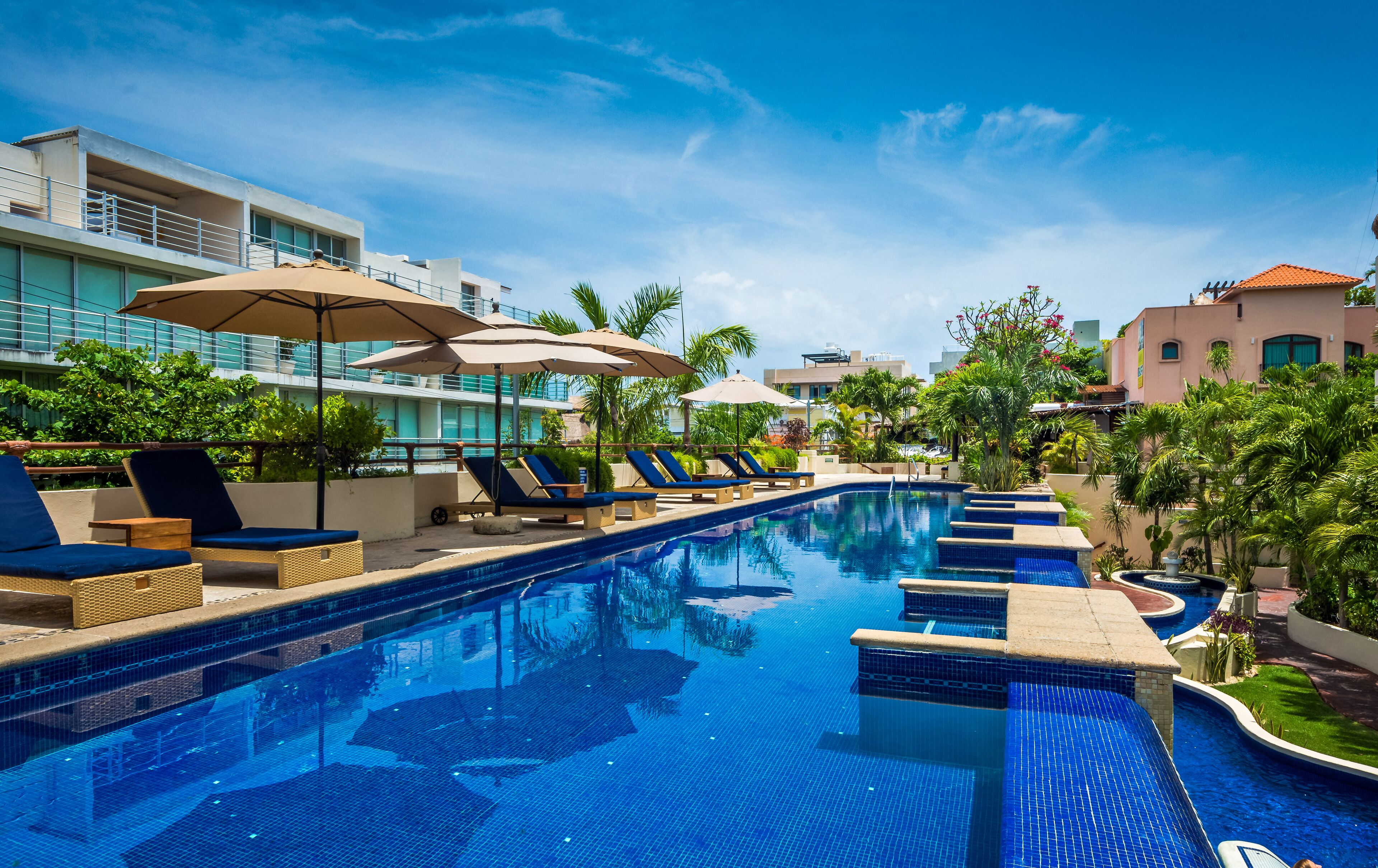 2 outdoor pools, open 8:00 AM to 9:00 PM, pool umbrellas, sun loungers