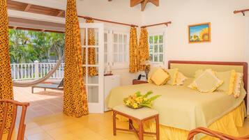 Deluxe Room, Ocean View | In-room safe, individually decorated, individually furnished, desk