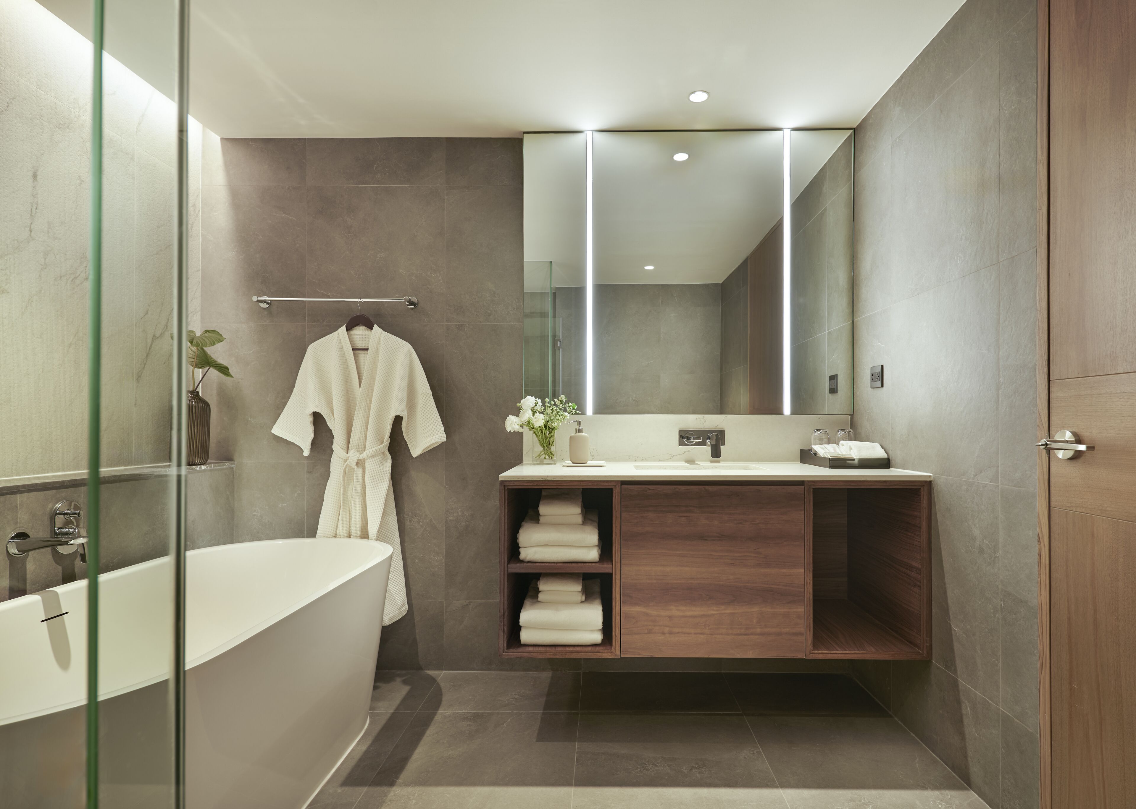 Two Bedroom Signature Suite | Bathroom | Separate bathtub and shower, hydromassage showerhead, free toiletries