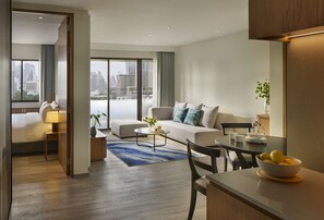 Two Bedroom Signature Suite | Living room | Flat-screen TV, DVD player, MP3 dock