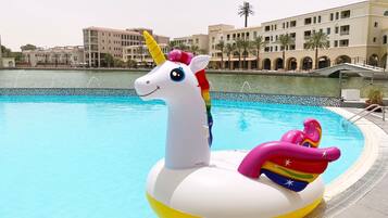 Outdoor pool, open 8:00 AM to 8:00 PM, pool umbrellas, sun loungers