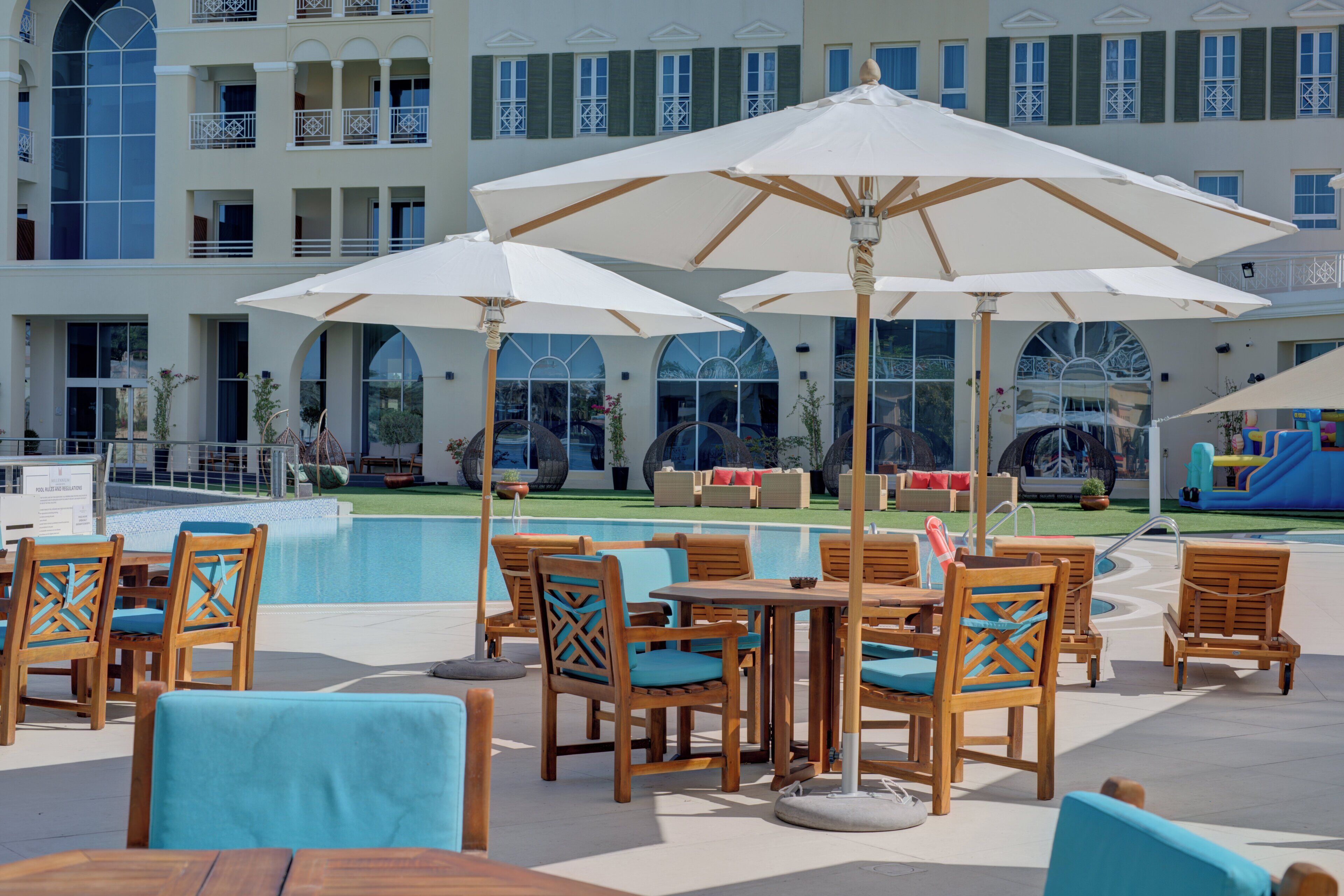 Outdoor pool, open 8:00 AM to 8:00 PM, pool umbrellas, pool loungers