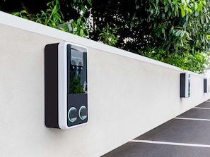 A parking garage with automated parking meters.