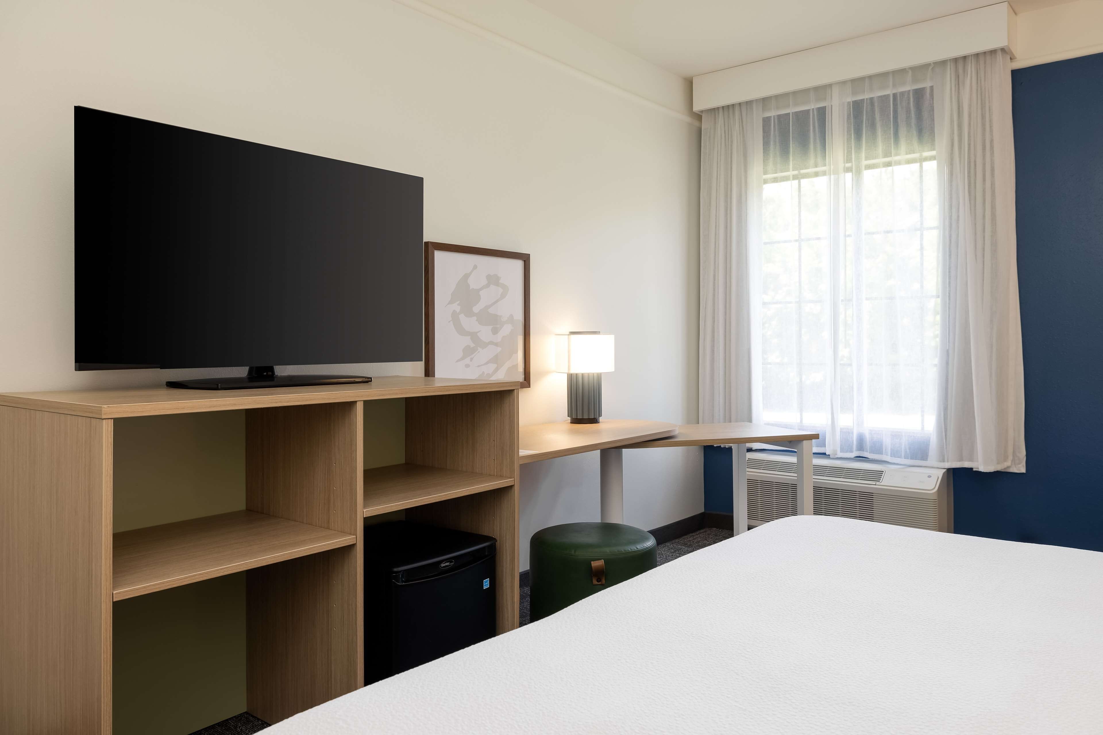 premium bedding, desk, laptop workspace, iron/ironing board