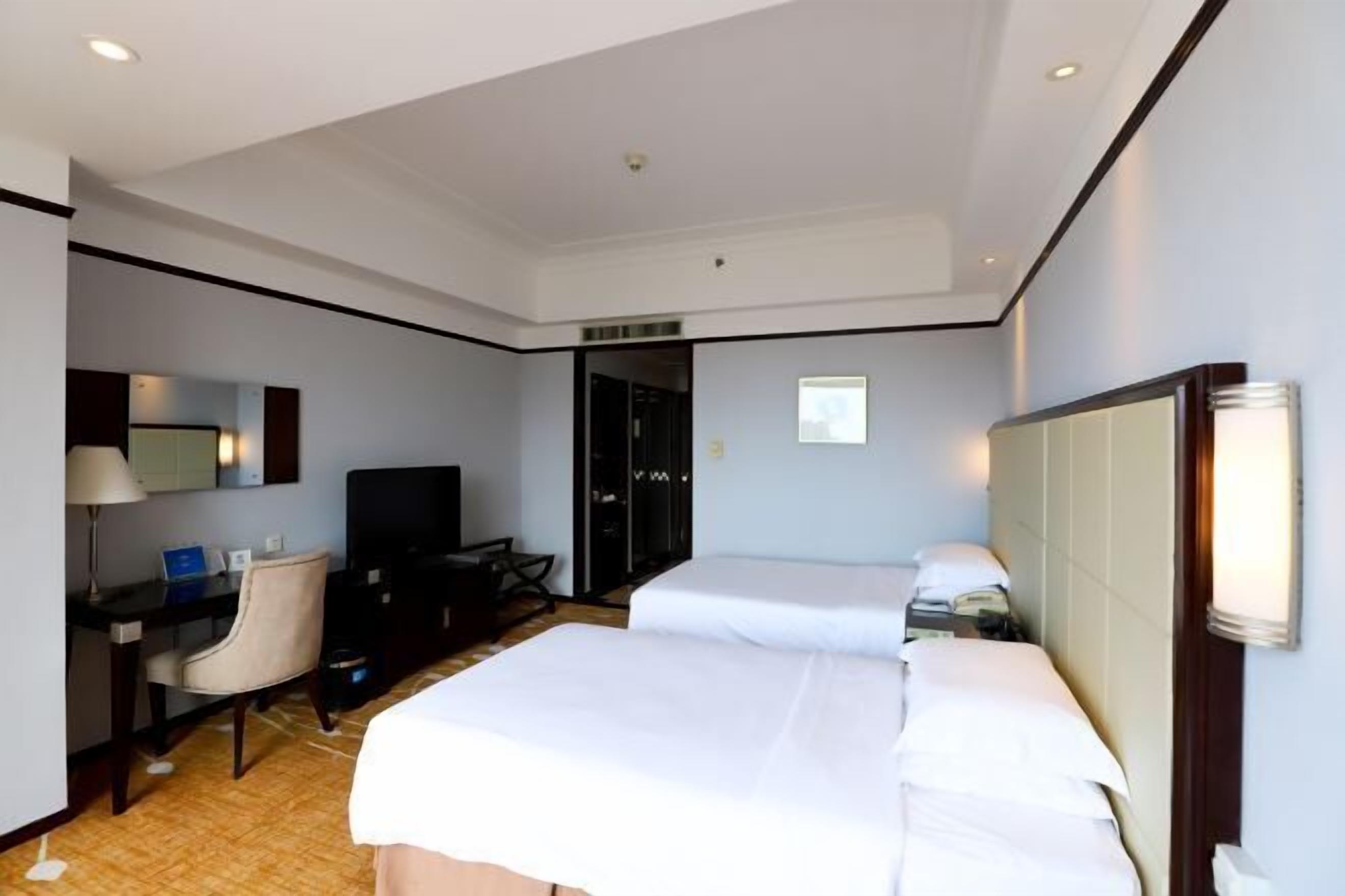 Minibar, desk, blackout drapes, soundproofing