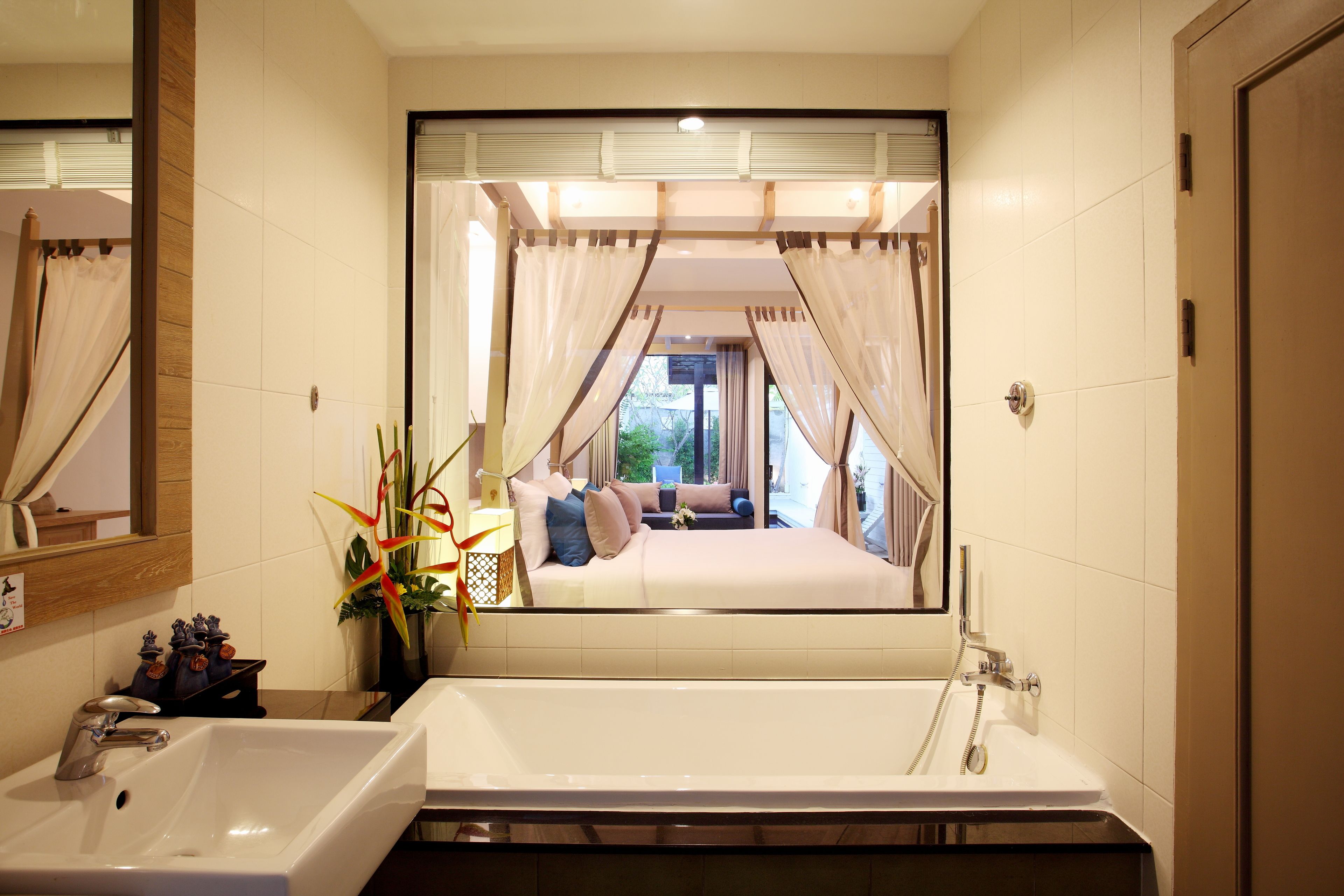 pool suites | bathroom | separate bathtub and shower, free toiletries, hair dryer, bathrobes