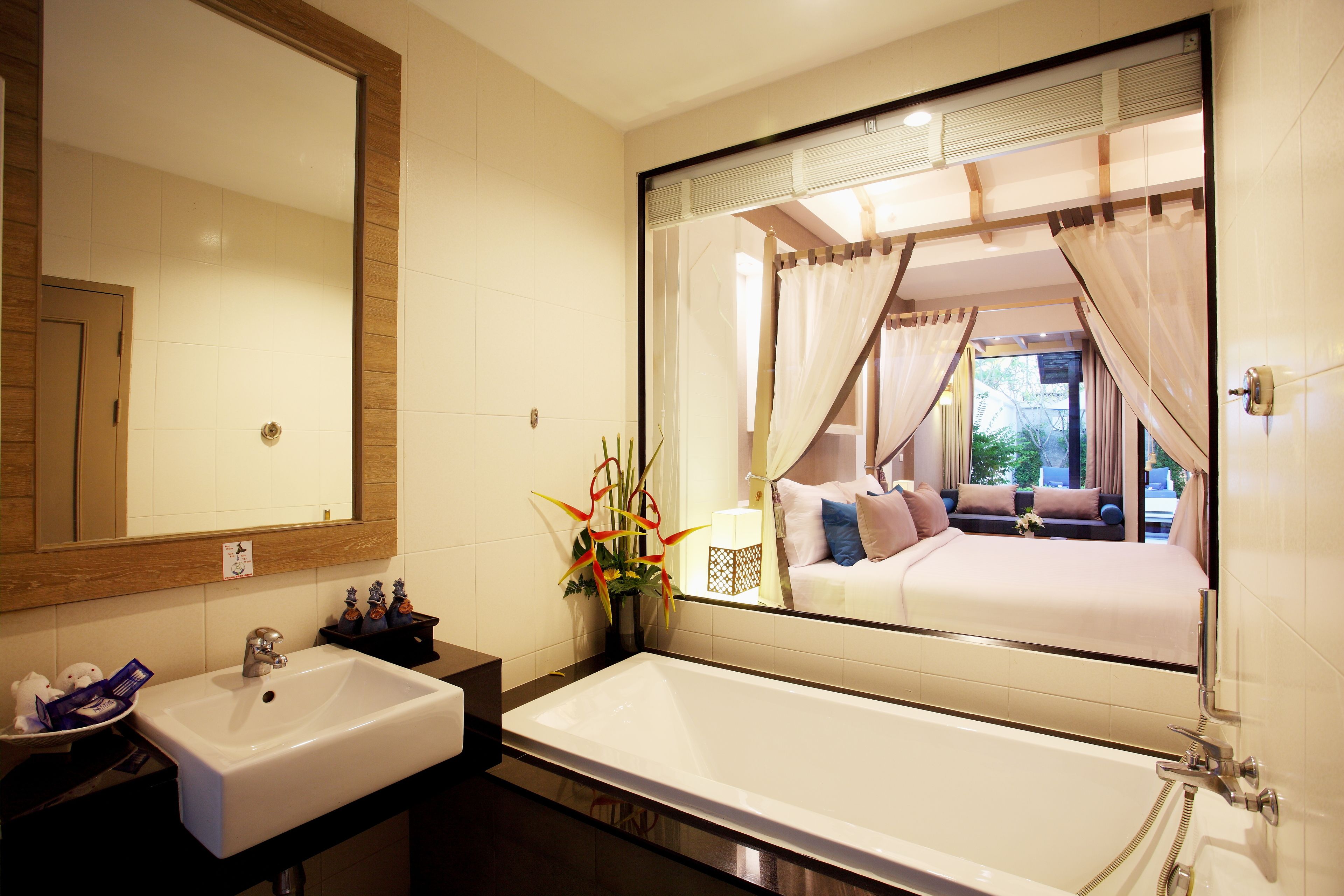 pool suites | bathroom | separate bathtub and shower, free toiletries, hair dryer, bathrobes