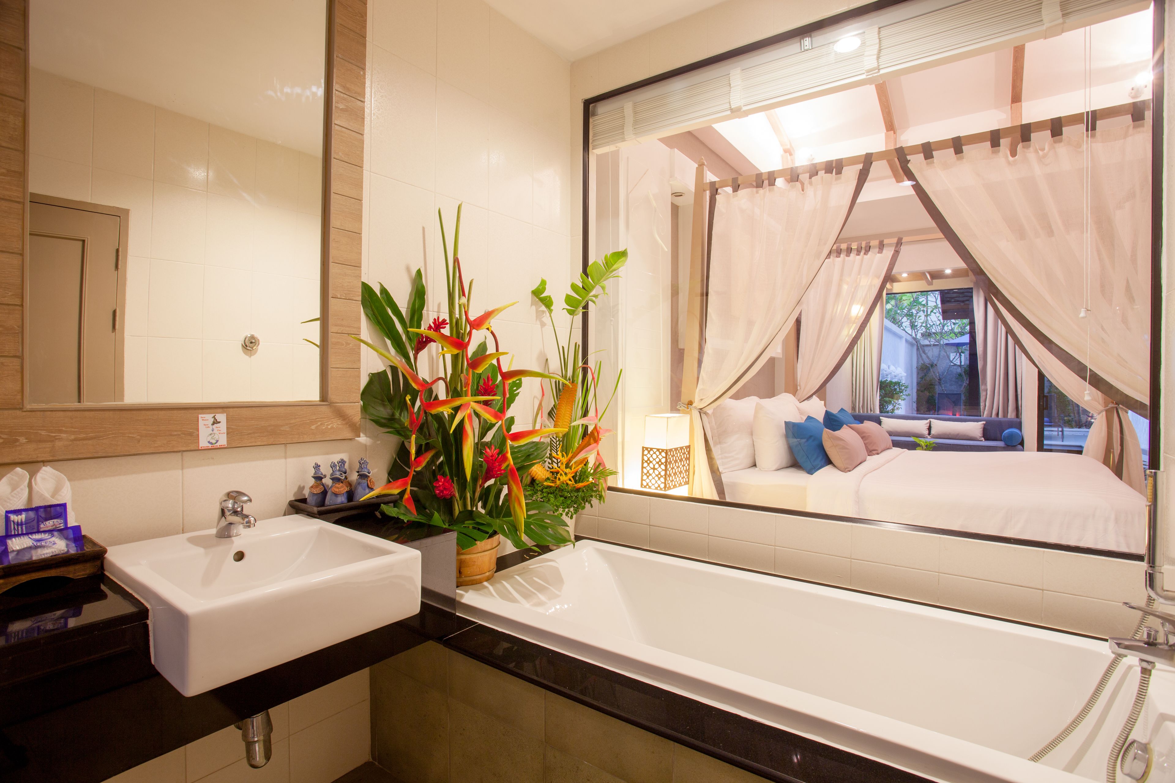 pool suites | bathroom | separate bathtub and shower, free toiletries, hair dryer, bathrobes