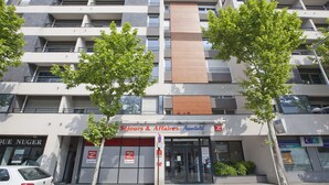 A multi-story building with a storefront labeled "Séjours & Affaires." - Séjours & Affaires Clermont-Ferrand Park Republique (Clermont-Ferrand)