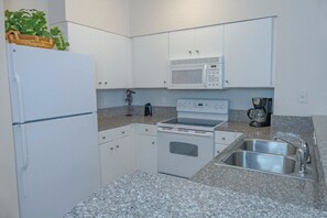 2.5 Bedroom /2 Bath condo | Private kitchen | Fridge, microwave, oven, stovetop