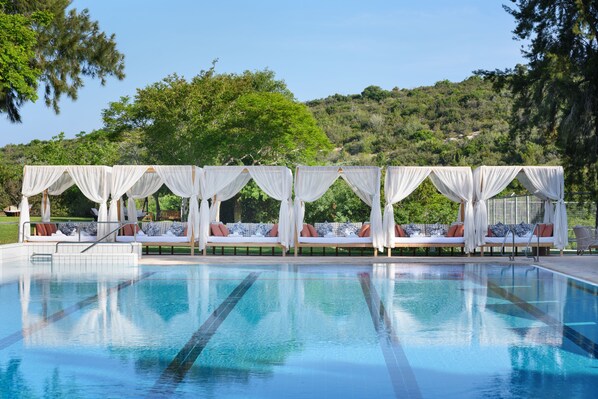 Indoor pool, outdoor pool, pool umbrellas, pool loungers