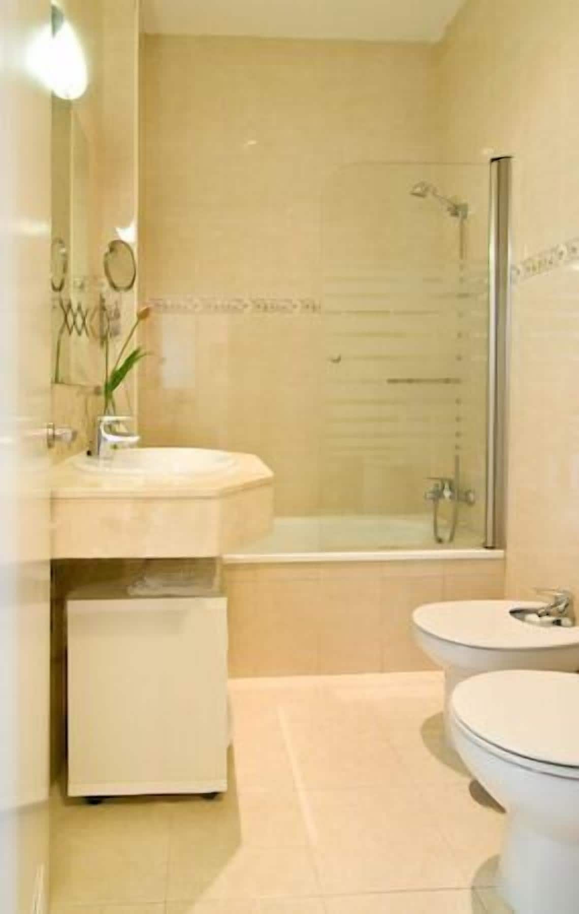 designer toiletries, hair dryer, towels, soap