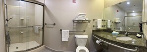 Executive Studio Suite, 1 King Bed | Bathroom | Combined shower/tub, designer toiletries, hair dryer, towels
