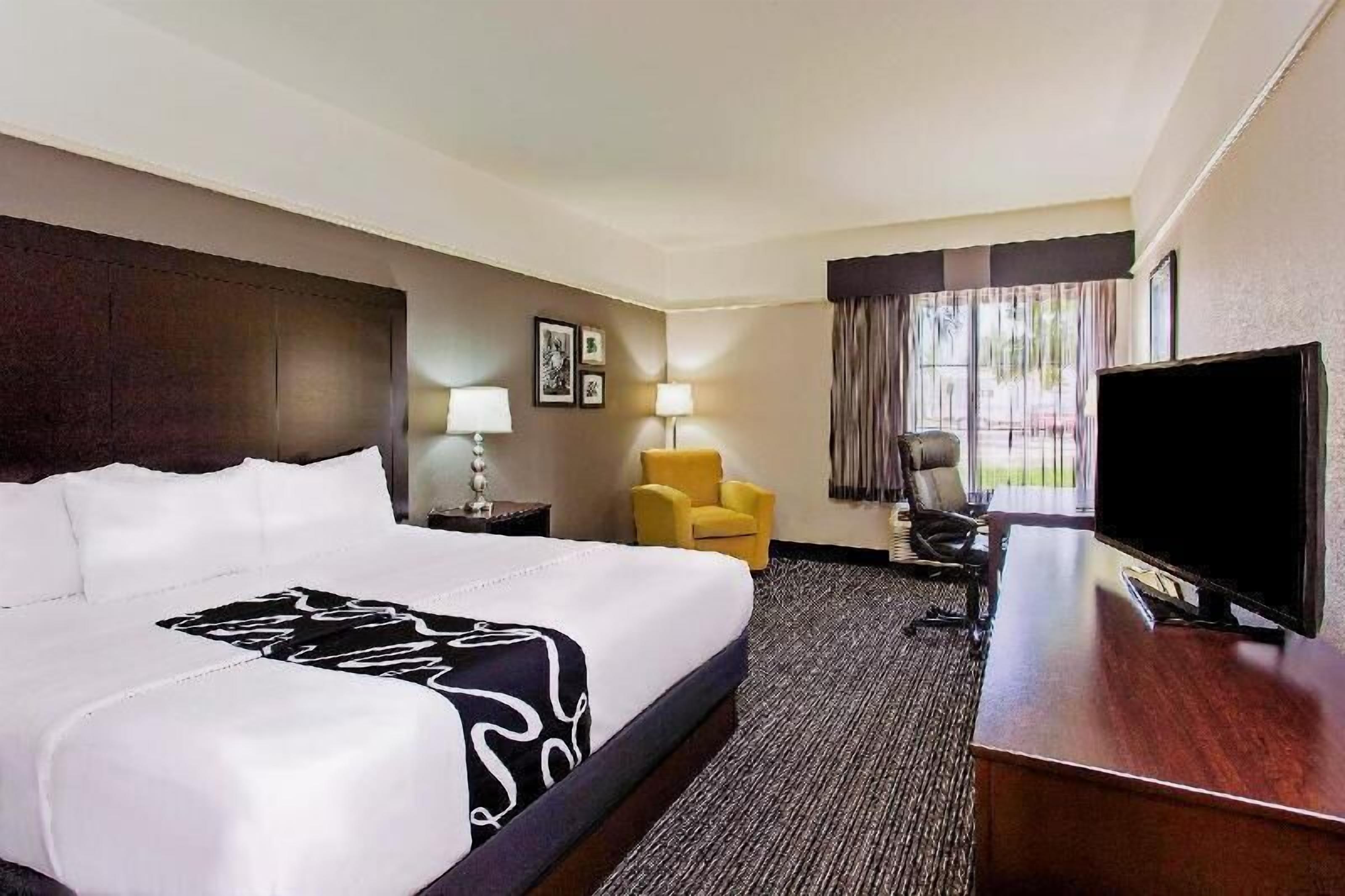 Premium bedding, desk, blackout drapes, iron/ironing board