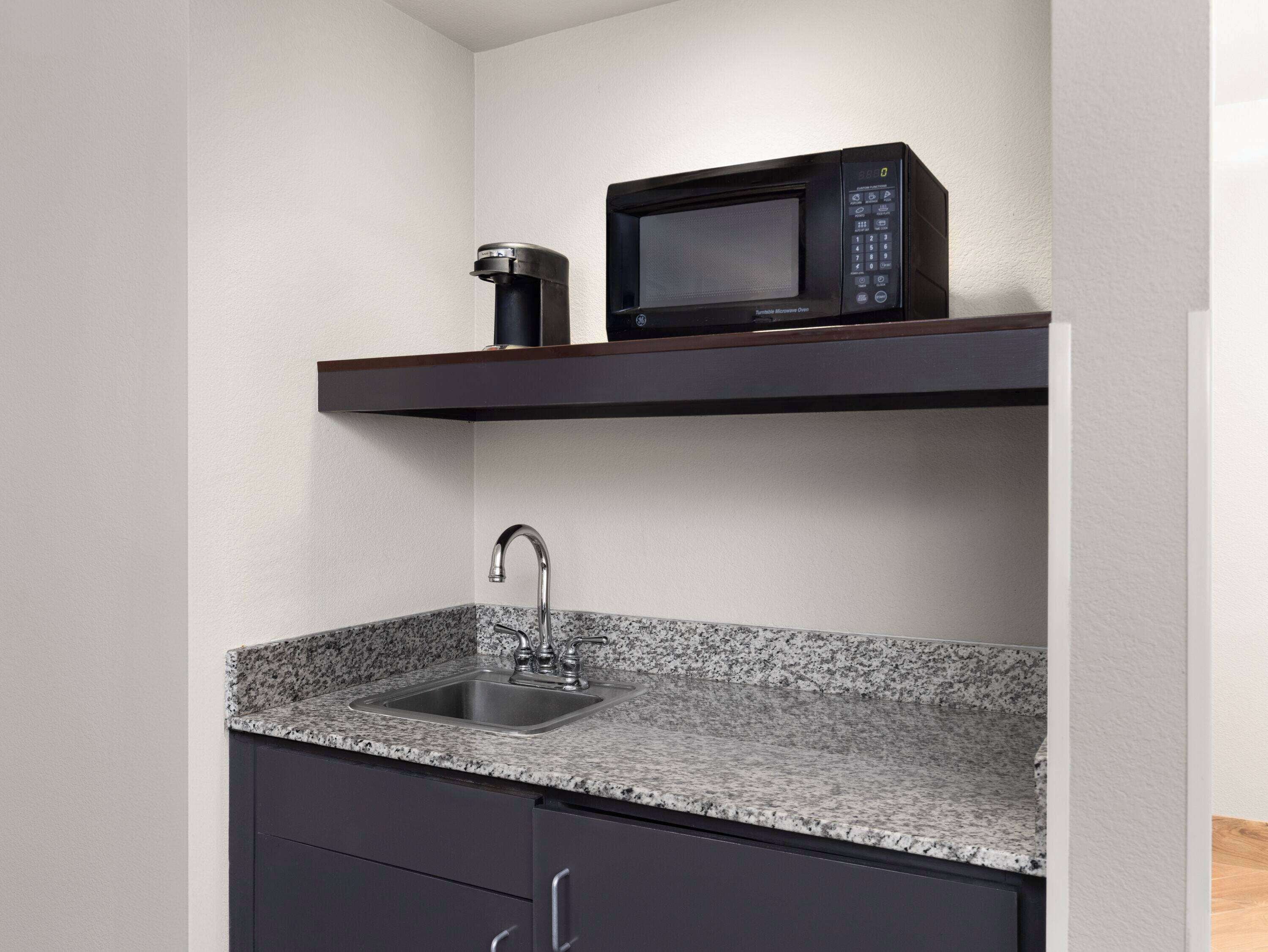 deluxe suite, 1 king bed, non smoking | premium bedding, desk, blackout curtains, iron/ironing board