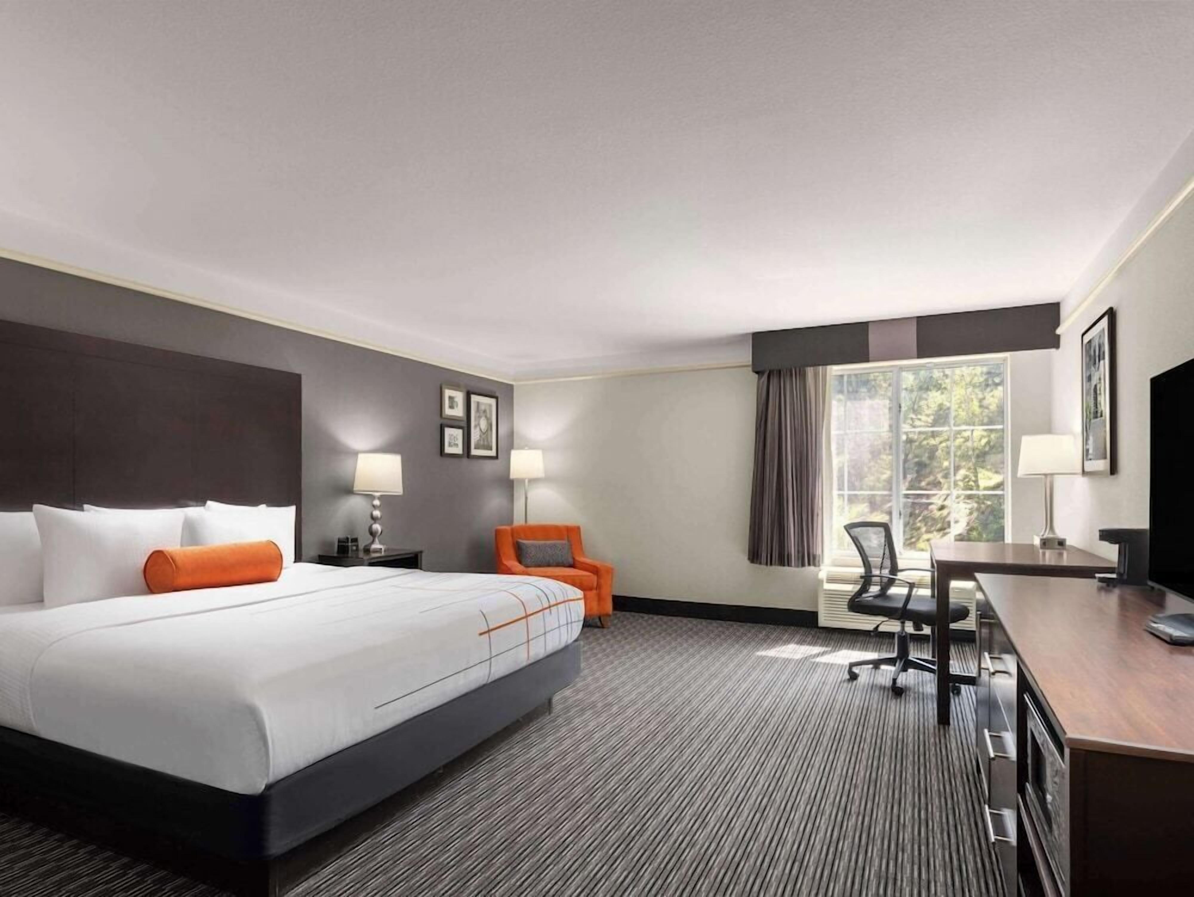 Premium bedding, desk, blackout drapes, iron/ironing board