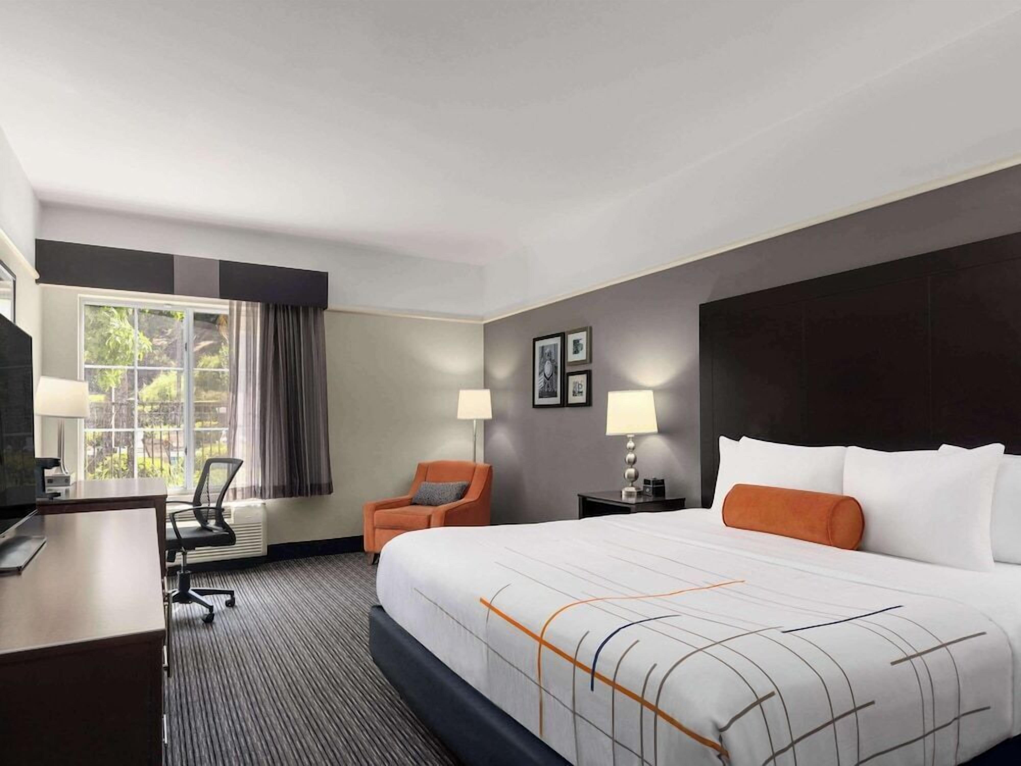 Premium bedding, desk, blackout drapes, iron/ironing board