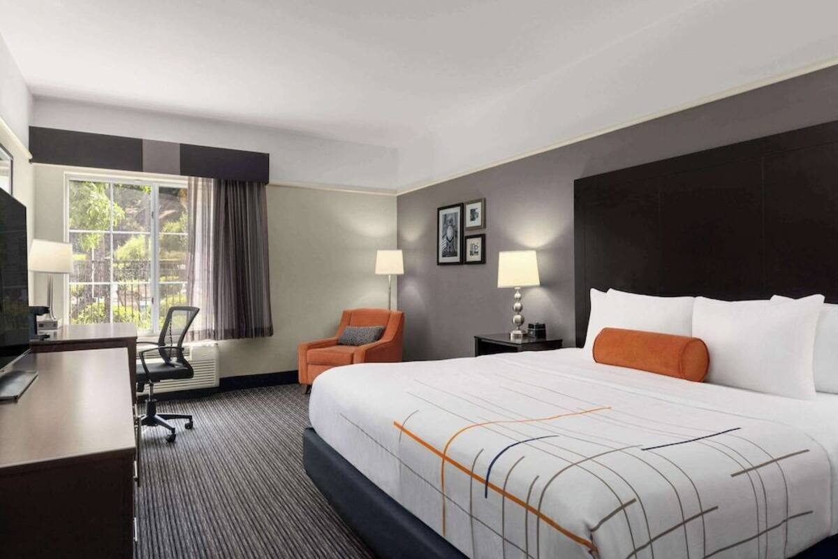 Premium bedding, desk, blackout drapes, iron/ironing board