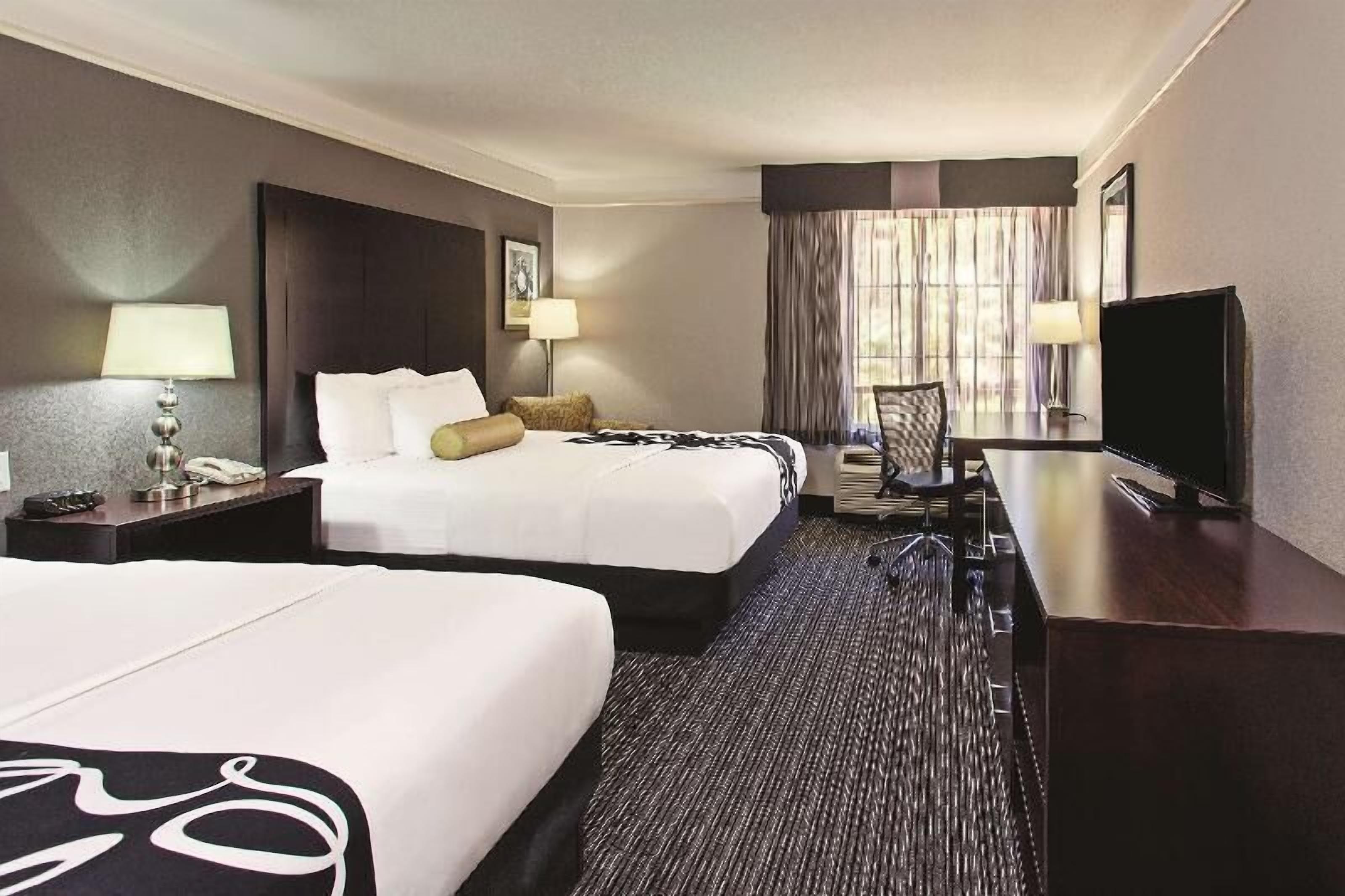 Premium bedding, desk, blackout drapes, iron/ironing board
