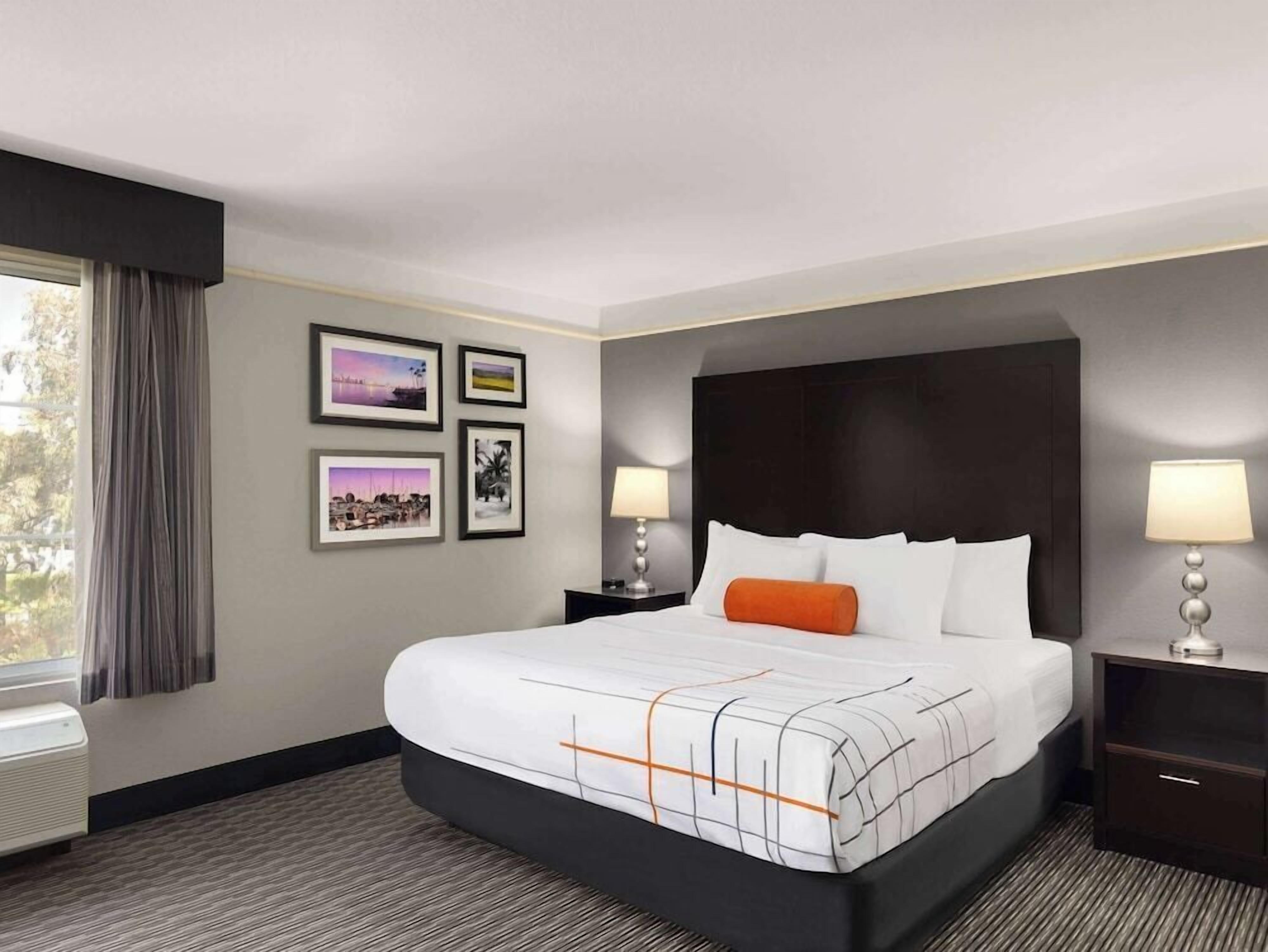 Premium bedding, desk, blackout drapes, iron/ironing board
